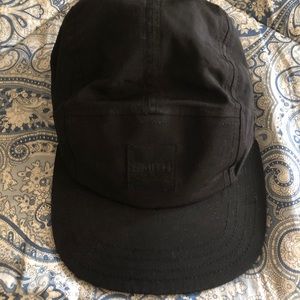 Smith Optics black five panel hat.
